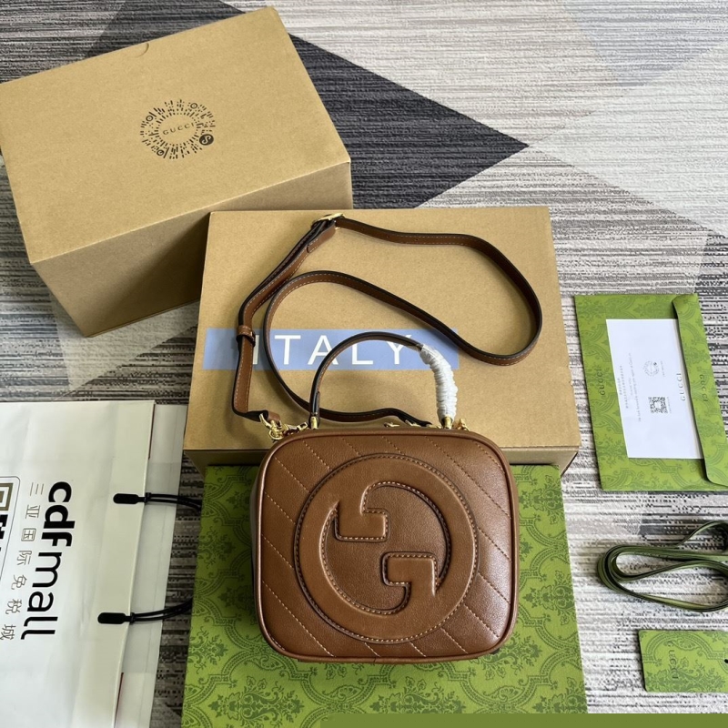 G*u*i top handle bags